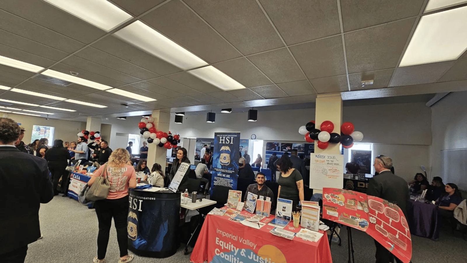 Tables lined up next to each other at the SDSU Imperial Valley Career Fair.